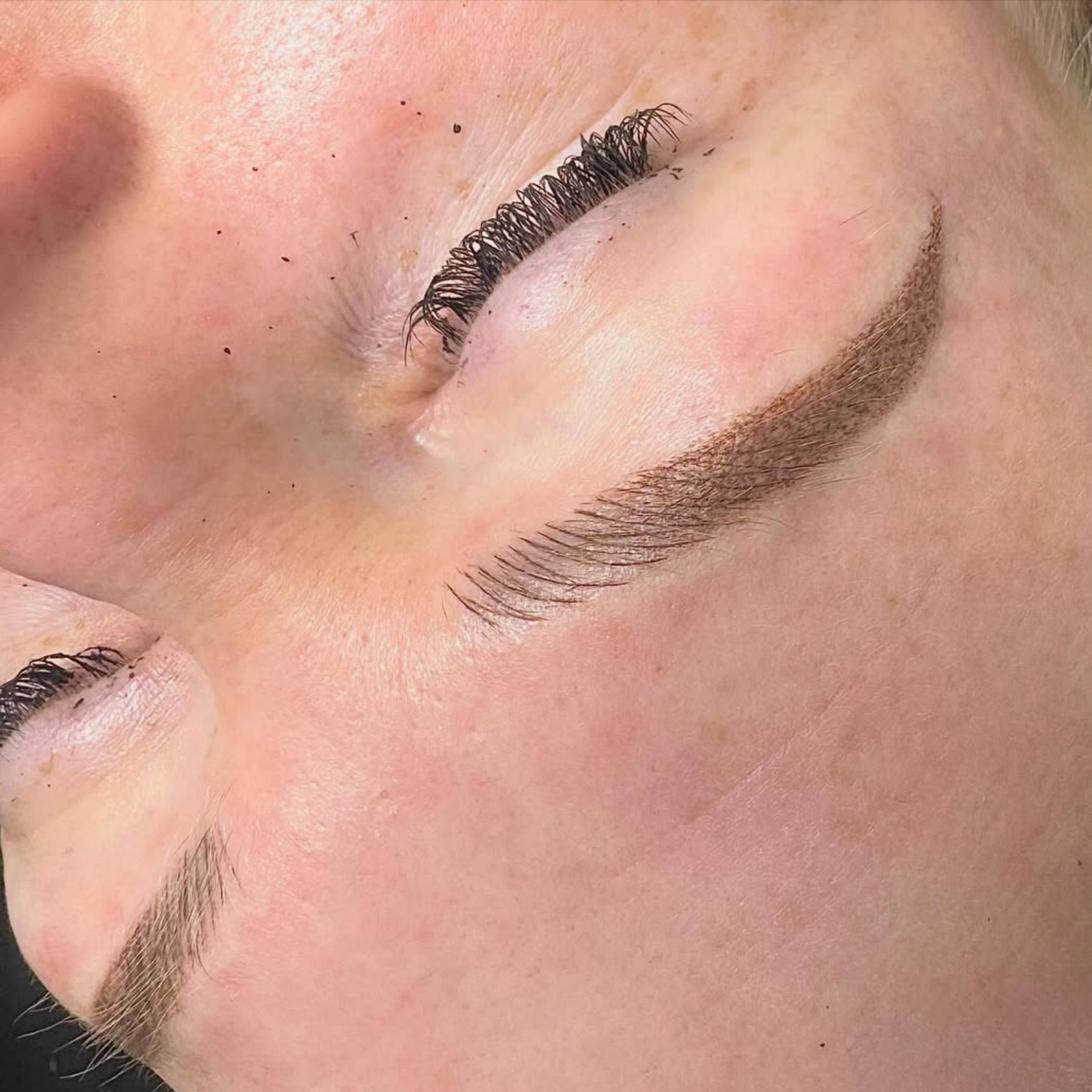 close up iron oxide pigmented eyebrows