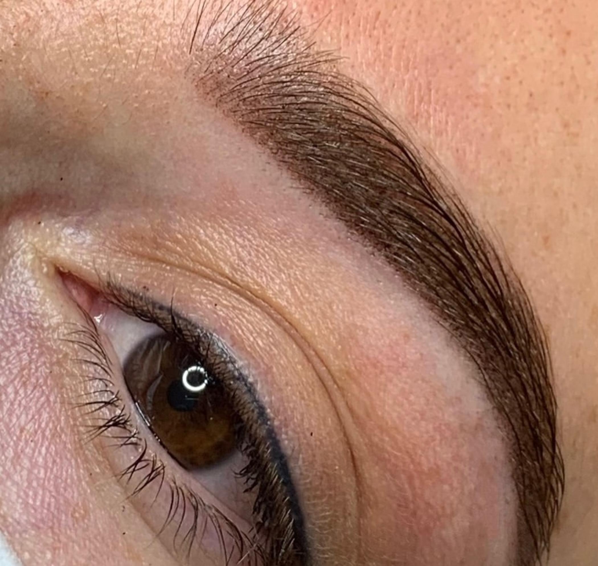 cosmetic tattoo artist preparing pigments