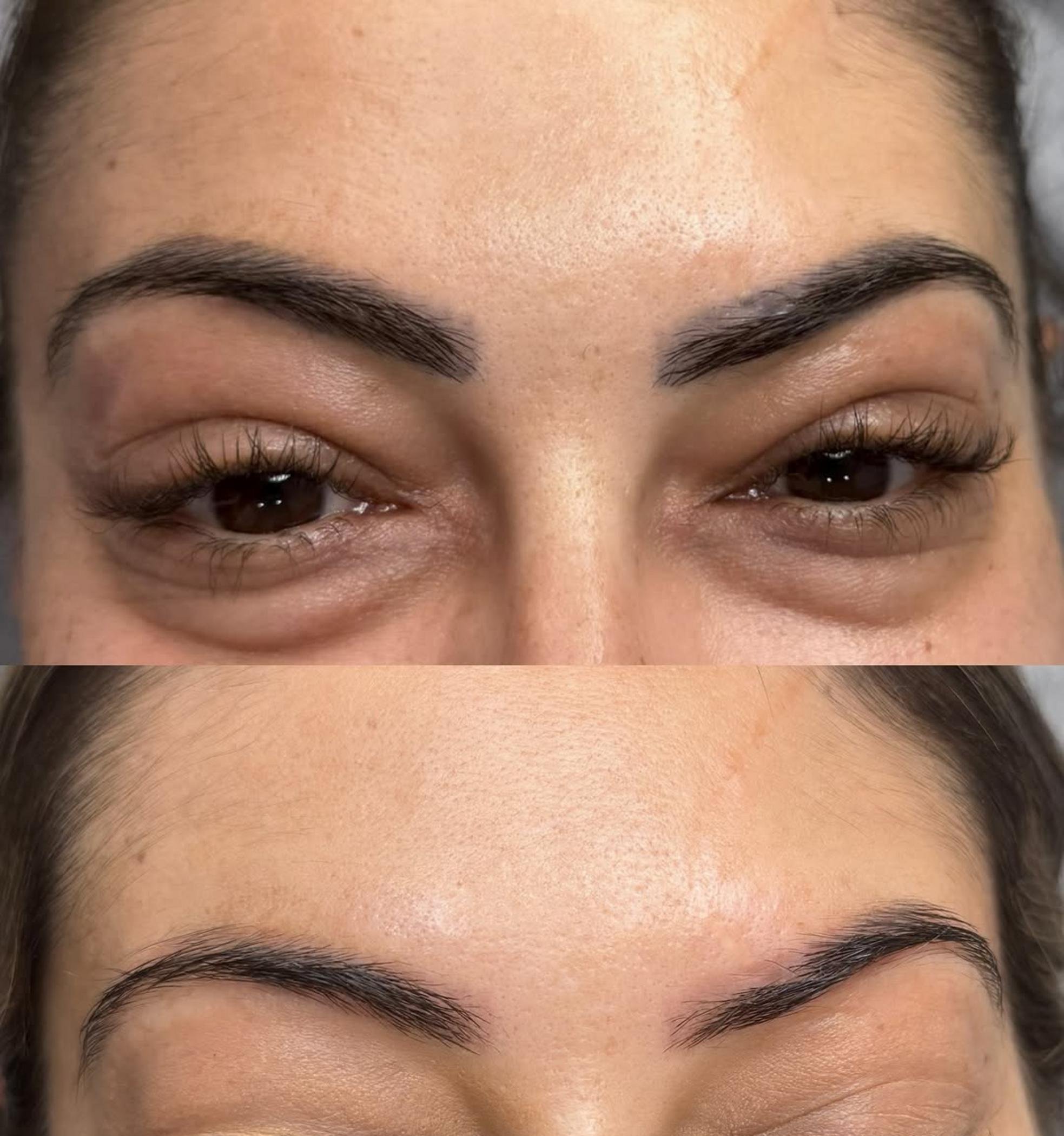 permanent makeup artist applying brows